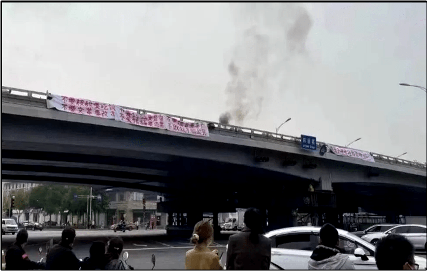 Mysterious Beijing Protester Sparks Hunt, Tributes Online