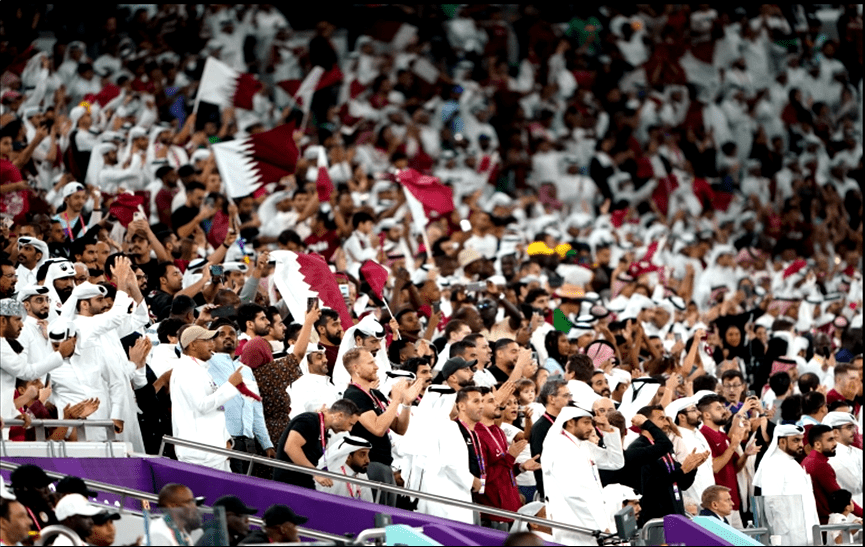 Qatar fans celebrate after their team scored its first goal against Senegal, Al Thumama Stadium in Doha, Qatar