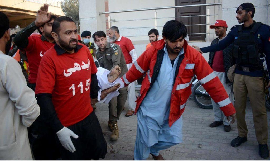 Rescue officials shifting blast victim to the hospital. APP/SYR/IQJ/FHA
